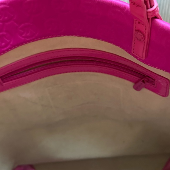 Michael Kors bright pink, has handles and also strap that comes off. - Picture 8 of 8